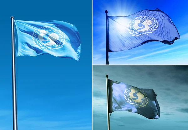 UNICEF vlag zwaaien op de wind — Stockfoto