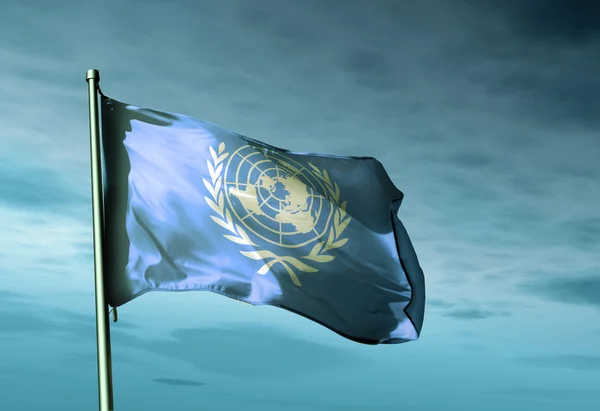 UN flag waving on the wind — Stock Photo, Image