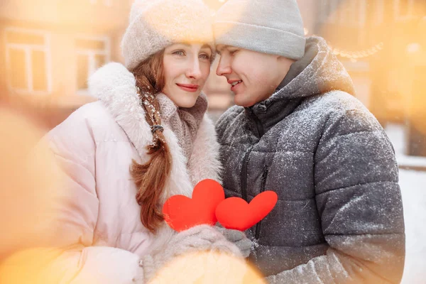 Young Loving Couple Winter Day Holding Red Paper Hearts Hands — Stock Photo, Image