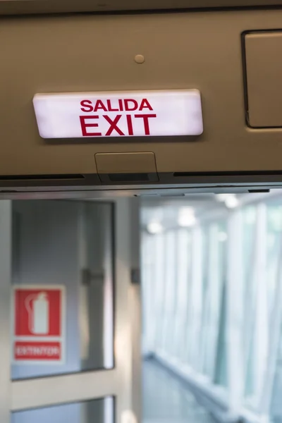 Airplane exit sign — Stock Photo, Image