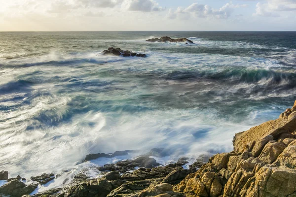 Sunset in the wild sea — Stock Photo, Image