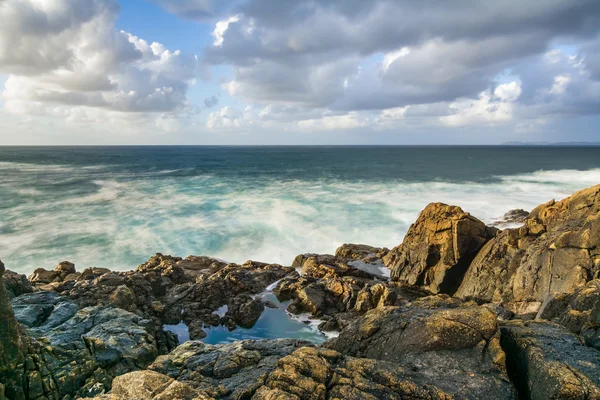 Sunset in the wild sea — Stock Photo, Image