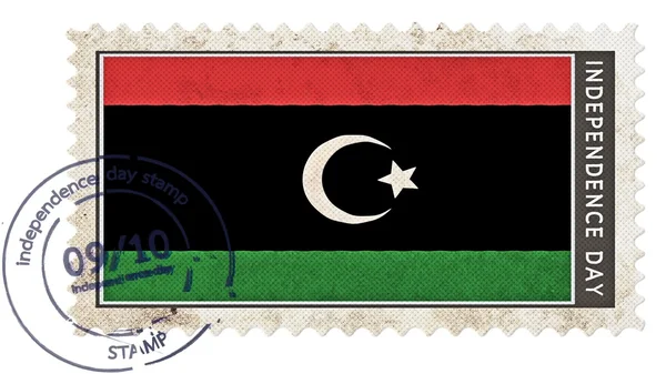 Vlajka Libye na razítko den nezávislosti se datum čerpadlo — Stock fotografie