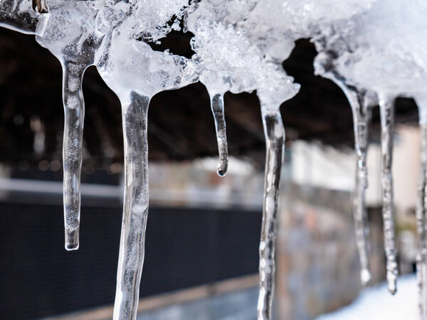 Icicles of ice formed during the night after the thawing of the snow that left the storm Filomena