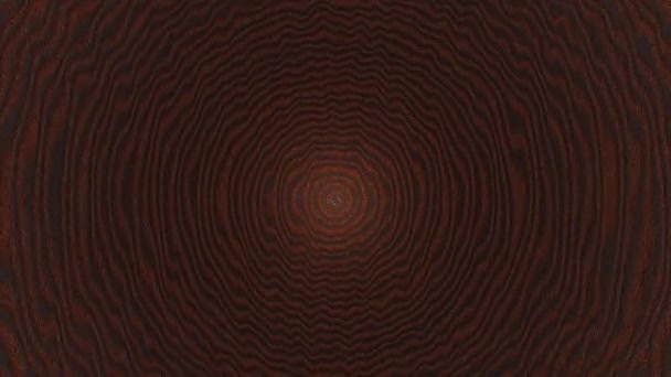 マクロショットで外側の端に向かって黒い不完全な円を作成する抽象的な茶色のラフの背景のズーム — ストック動画