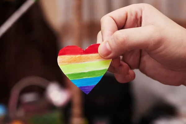 Lgbt valentines day concept, rainbow heart in hand, copy space — Stock fotografie