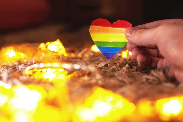 Lgbt valentines day concept, rainbow heart in hand, copy space — Stock fotografie