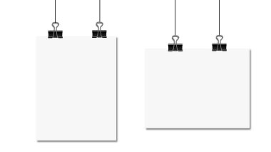 beyaz arkaplanda siyah klasörlü ataçlar.