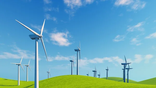 Close up of wind turbines on green hills — Stock Photo, Image