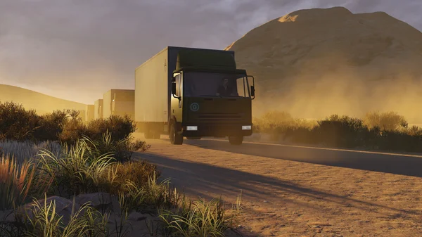 Military trucks on a desert road 1