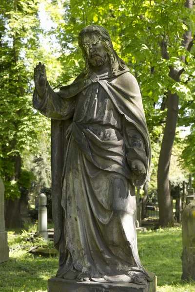Historic Jesus on the spring mystery old Prague Cemetery, Czech Republic — Stock Photo, Image