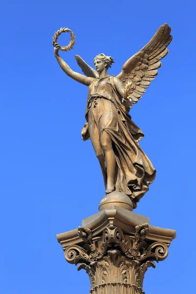 Golden Angel in front of House of Artists, Prague, Czech republic — Stock Photo, Image