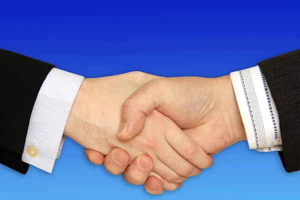 Бизнесмены пожимают друг другу руки — стоковое фото