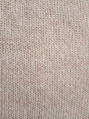 Pembe örgü yün desen arka plan ve doku 