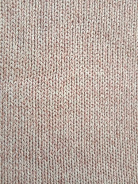 Pembe örgü yün desen arka plan ve doku 