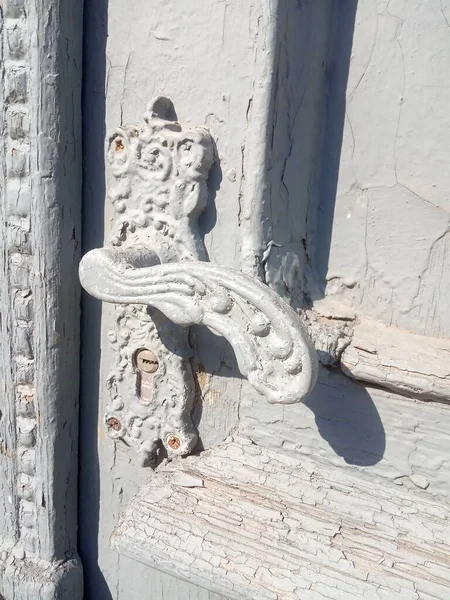 patterned door handle, vintage door element