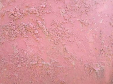 Metal kırmızı bordo boya, çatlak arka plan. 