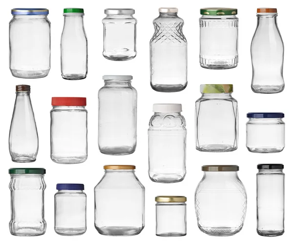 Set of empty jars with caps isolated on white background — Stock Photo, Image