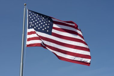 Amerikan bayrağının rüzgarda sallayarak fotoğraf