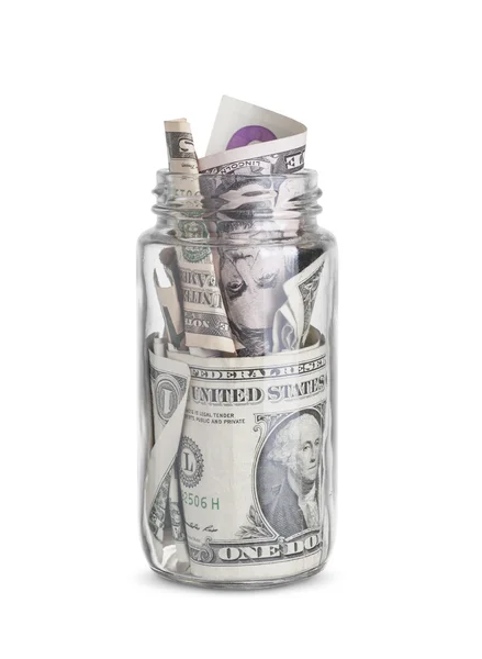 Billetes de dólar en un frasco de vidrio aislado sobre fondo blanco —  Fotos de Stock