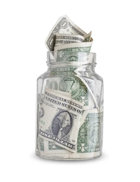 Dollarbiljetten in een glazen pot geïsoleerd op witte achtergrond — Stockfoto