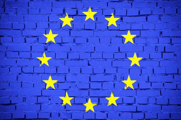 Vlajka Evropské unie nad cihlovou zeď — Stock fotografie