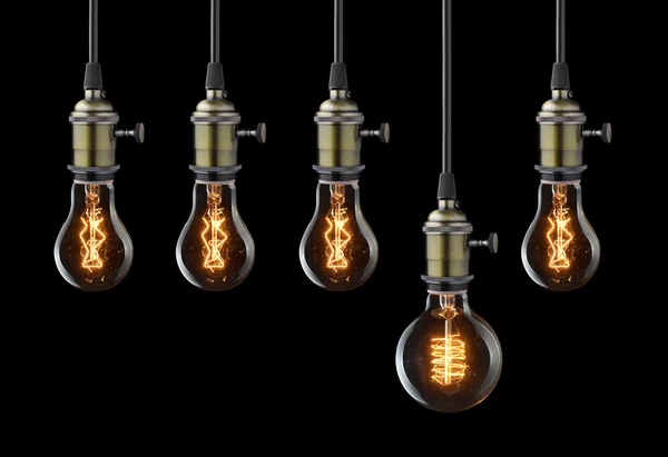 Idea concept. Vintage light bulbs on black — Stock Photo, Image