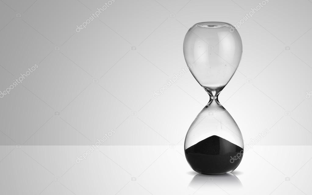 hourglass on gray background