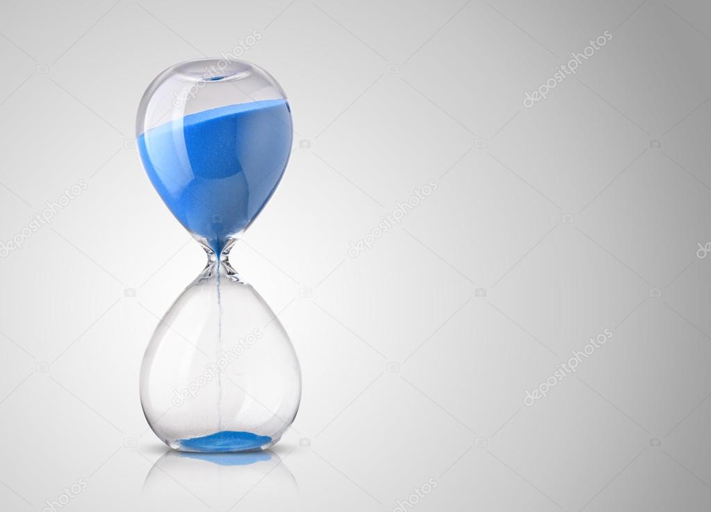 hourglass on gray background