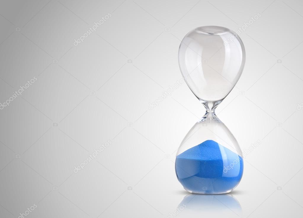 hourglass on gray background