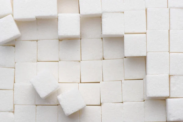 Close up de cubos de açúcar branco — Fotografia de Stock