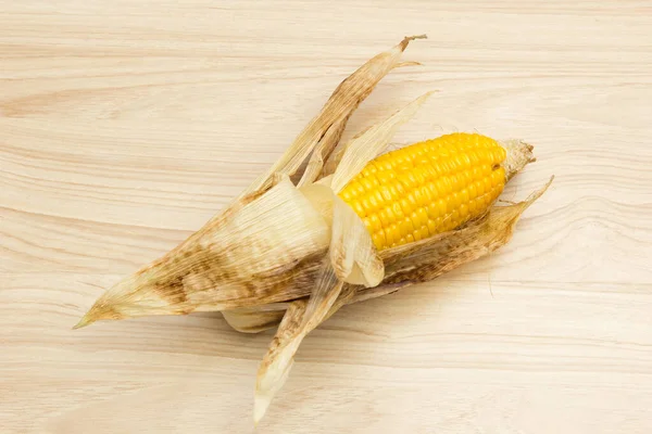 Burnt Corn Cooked Wooden Background — Stock Photo, Image