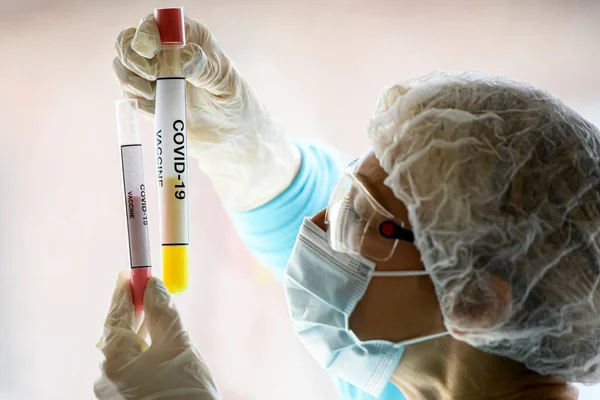 Woman Protective Suit Face Mask Holding Test Tube Samples Vaccine — Stock Photo, Image