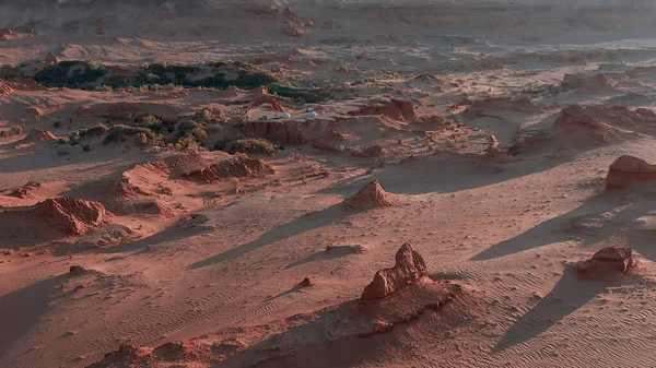 Martian landscape, Flaming Cliffs aerial view in the Gobi Desert. Scorched earth where the remains of dinosaurs rest, and the layings of their eggs. Mongolia. Canyon Herman-Tsav.