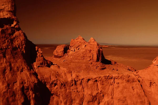 Fantastic martian landscape in rusty orange shades, Mars surface, Desert, Cliffs, sand. Alien landscape. Red planet mars.