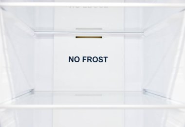 An empty refrigerator. Inside an empty, clean no frost refrigerator, a refrigerator compartment after defrosting clipart