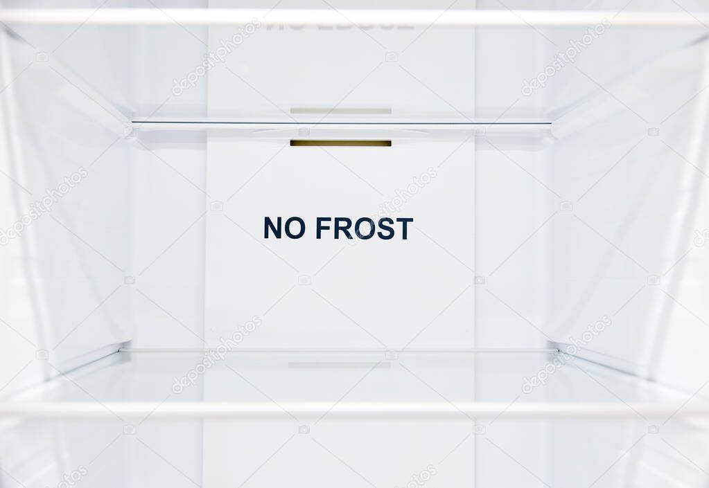 An empty refrigerator. Inside an empty, clean no frost refrigerator, a refrigerator compartment after defrosting