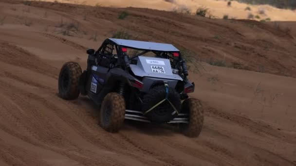 Sport car for Off Road Extreme Racing gets over the difficult part of the route during the Rally raid in sand. THE GOLD OF KAGAN-2021. slow motion 120 fps. 25.04.2021 Astrakhan, Russia — Stock Video