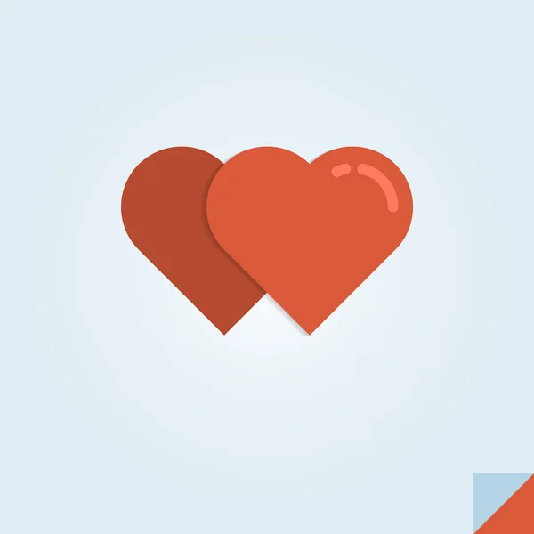 Dos corazones rojos sobre un papel doblado — Vector de stock