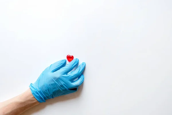 Les Mains Médecin Gants Médicaux Sur Fond Blanc Tenant Des — Photo