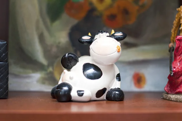 Souvenir or moneybox, smiling cow — Stock Photo, Image