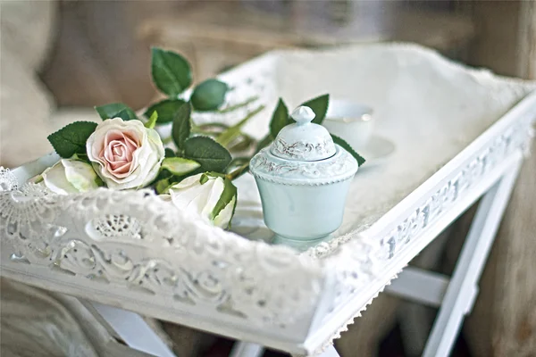 Rose on a vintage tray — Stock Photo, Image