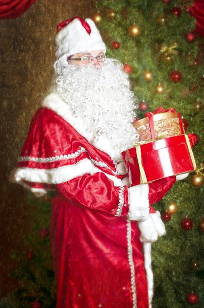 Santa Claus avec des cadeaux — Photo