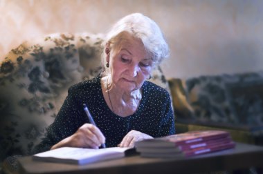 elderly woman writing   clipart
