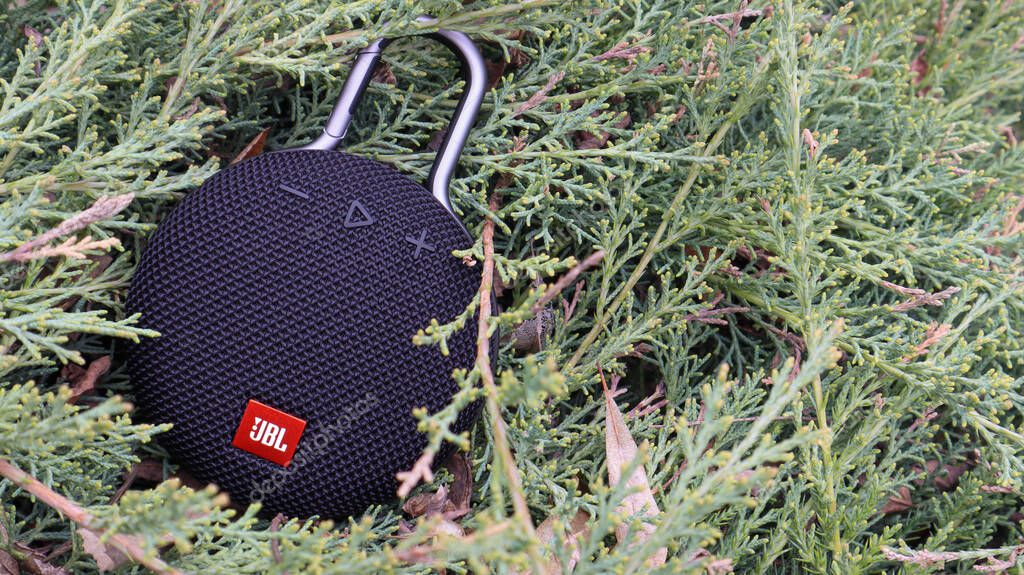 Waterproof round Bluetooth-speakers JBL Clip 3 in black color with a carabiner. Digital music and audio concept. Mini, suitable for travel. Ukraine, Kiev - June 09, 2021