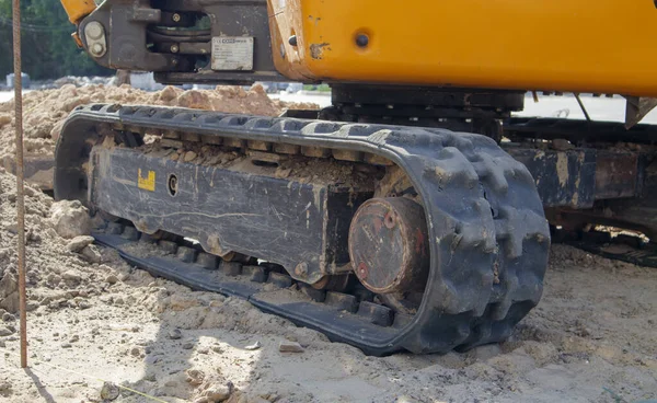 Two Small Excavators Large Construction Site Bright Green Wheels Yellow — Stock Photo, Image