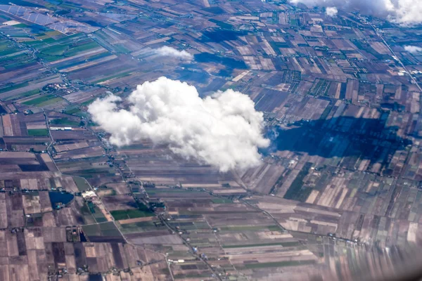 Cloud and farm land from  air plane — Stock Photo, Image