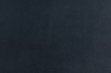 Parlak merkez spot ışığı ve siyah vignette sınır çerçevesine sahip soyut gri arkaplan kağıdı