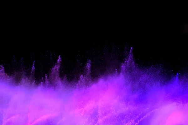 Geceleyin renkli çeşmenin hareket bulanıklığı