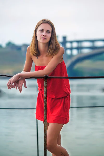 Girl in a red sundress — Stock Photo, Image